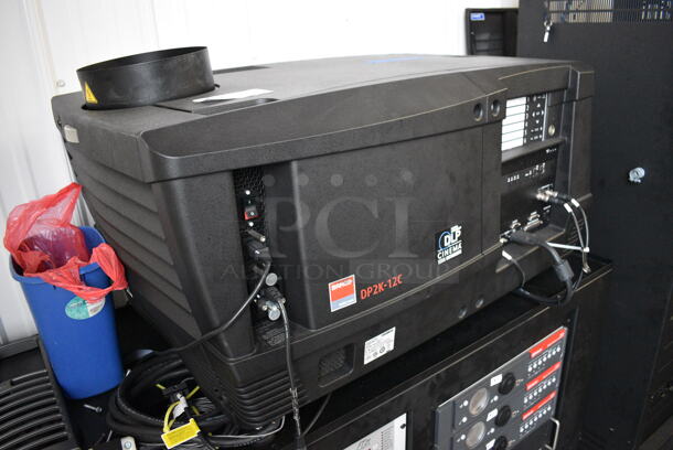 MARVELOUS! 2012 Barco Model DP2K-12C Commercial Countertop DLP Cinema Projector on Cabinet w/ Film-Tech FT21 Automation Cinema System, 4 Dolby CP750 Digital Cinema Processors, DCM Powercom, TV Monitor and Tripp Lite Surge Protector. 200-240 Volts. 26x38x22, 24x53x38 - Image 6 of 11