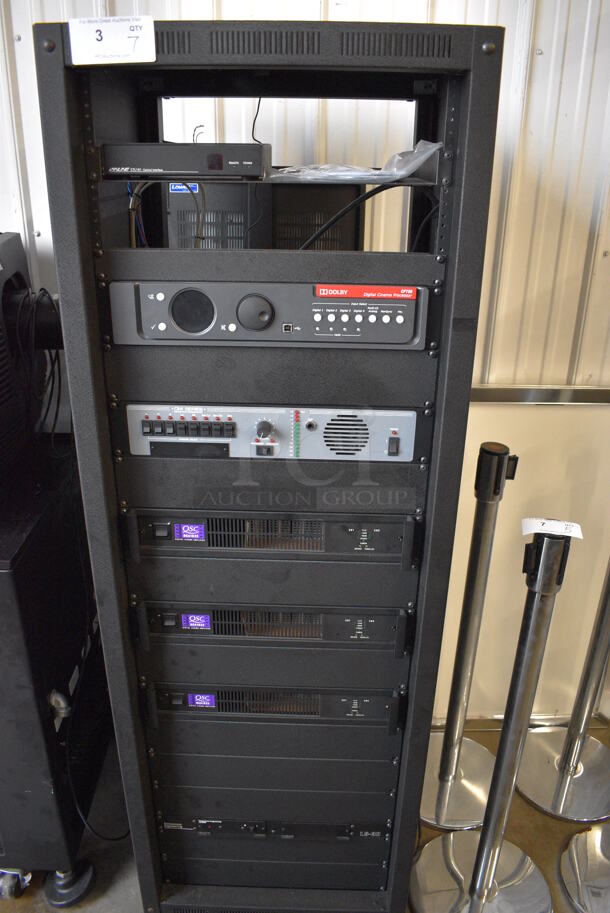 7 FANTASTIC! Items In Black Metal Rack Unit; Inline CTL101 Central Interface, Dolby CP750 Digital Cinema Processor, CM Series , 3 QSC BCA1622 Digital Cinema Amplifiers and Component Engineering LS-30-M. 22.5x22x69. 7 Times Your Bid!