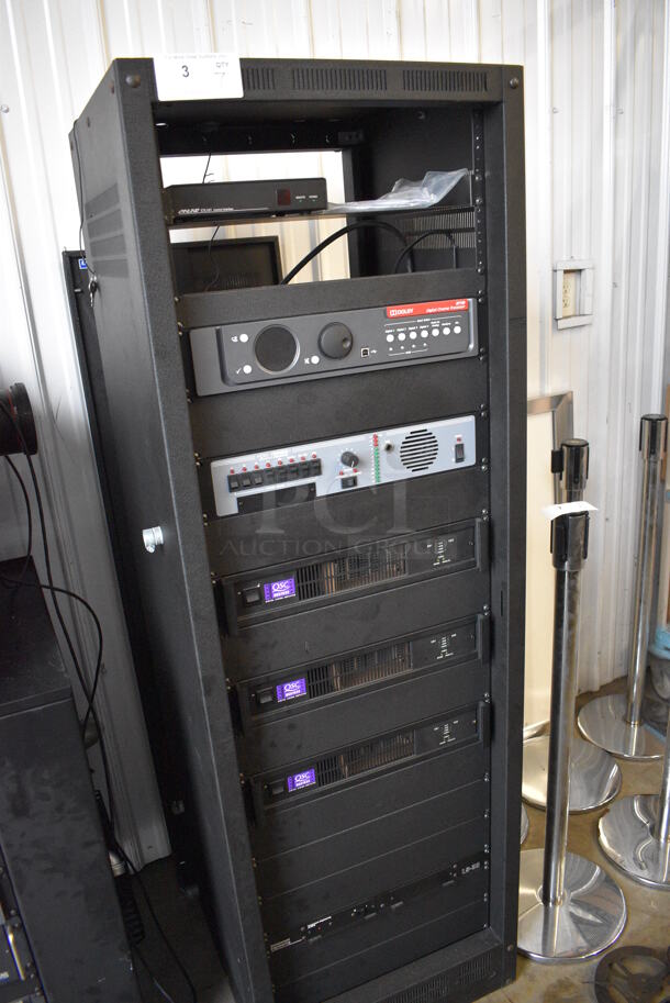 7 FANTASTIC! Items In Black Metal Rack Unit; Inline CTL101 Central Interface, Dolby CP750 Digital Cinema Processor, CM Series , 3 QSC BCA1622 Digital Cinema Amplifiers and Component Engineering LS-30-M. 22.5x22x69. 7 Times Your Bid! - Image 2 of 8