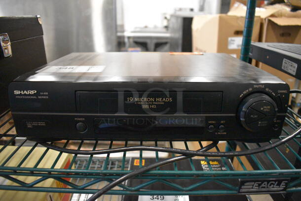 Sharp Model XA-605 VHS Player. 15x11x4