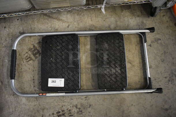 Cosco Gray and Black 2 Step Stepladder. 17x2x39 - Image 1 of 2