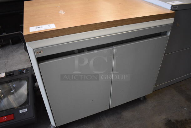 Tan Metal Cart w/ 2 Doors and Wood Pattern Counter on Commercial Casters. 30x25x27.5 - Image 2 of 4