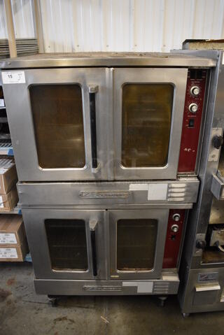 2 FANTASTIC! Southbend Stainless Steel Commercial Gas Powered Full Size Convection Ovens w/ View Through Doors, Metal Oven Racks and Thermostatic Controls on Commercial Casters. 38x40x71. 2 Times Your Bid!