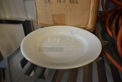 24 BRAND NEW IN BOX! White Ceramic Plates. 7x7x1. 24 Times Your Bid!