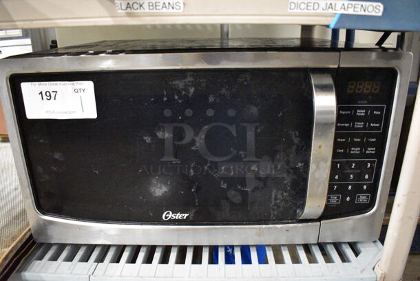 Oster Countertop Microwave Oven. 22x18x12
