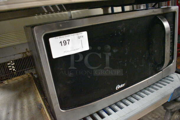 Oster Countertop Microwave Oven. 22x18x12 - Image 2 of 3