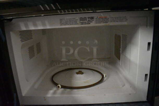 Oster Countertop Microwave Oven. 22x18x12 - Image 3 of 3