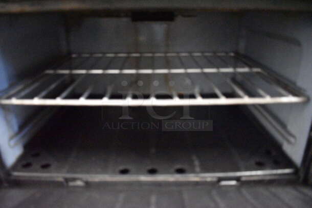 NICE! Garland Metal Commercial Gas Powered 6 Burner Range w/ Right Side Flat Top Griddle, 2 Lower Ovens and Metal Overshelf. 60x33x60 - Image 6 of 9