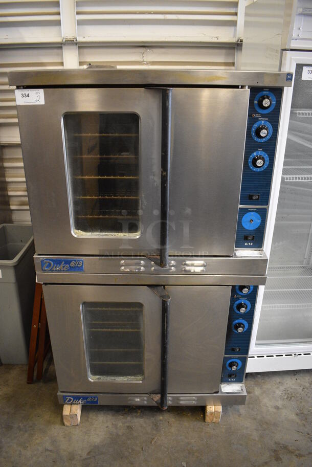 2 BEAUTIFUL! Duke Stainless Steel Commercial Gas Powered Convection Ovens w/ Solid Door, View Through Door, Metal Oven Racks and Thermostatic Controls on Commercial Casters. 38x41x62. 2 Times Your Bid!