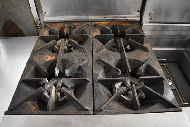 GREAT! Garland Model S-4-20 Stainless Steel Commercial Natural Gas Powered 4 Burner Range w/ Lower Oven and Stainless Steel Overshelf. 24x33x59 - Image 3 of 9