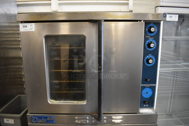 2 BEAUTIFUL! Duke Stainless Steel Commercial Gas Powered Convection Ovens w/ Solid Door, View Through Door, Metal Oven Racks and Thermostatic Controls on Commercial Casters. 38x41x62. 2 Times Your Bid! - Image 4 of 10