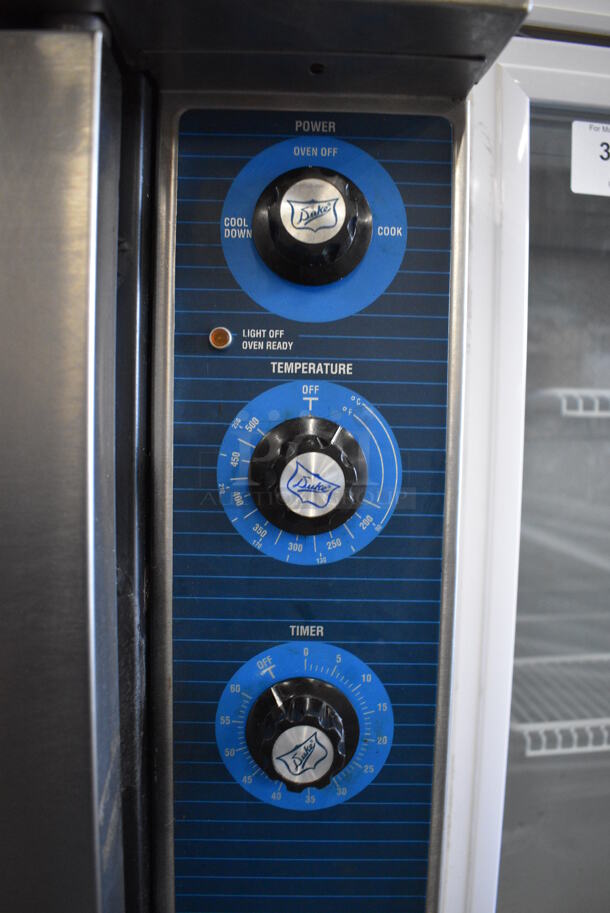 2 BEAUTIFUL! Duke Stainless Steel Commercial Gas Powered Convection Ovens w/ Solid Door, View Through Door, Metal Oven Racks and Thermostatic Controls on Commercial Casters. 38x41x62. 2 Times Your Bid! - Image 6 of 10