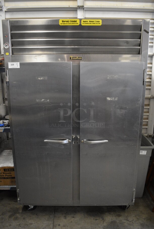 WOW! Traulsen Model RET232NUT-FHS Stainless Steel Commercial 2 Door Reach In Cooler on Commercial Casters. 115 Volts, 1 Phase. 52x35x83. Cannot Test Due To Plug Style - Image 1 of 7