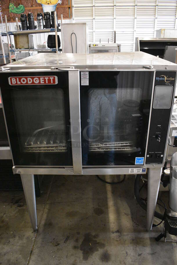 SWEET! Blodgett Model HV-100G ENERGY STAR Stainless Steel Commercial Gas Powered Full Size Convection Hydrovection Oven w/ View Through Doors and Metal Oven Racks on Metal Legs. - Image 1 of 9