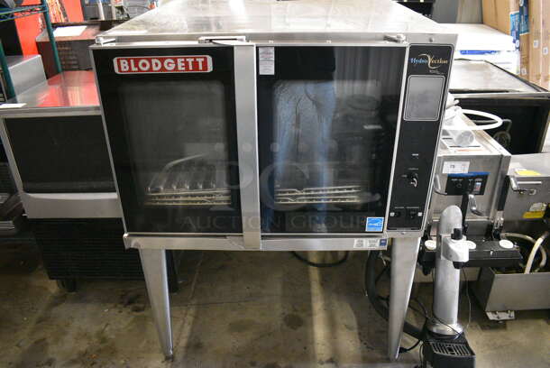 SWEET! Blodgett Model HV-100G ENERGY STAR Stainless Steel Commercial Gas Powered Full Size Convection Hydrovection Oven w/ View Through Doors and Metal Oven Racks on Metal Legs. - Image 2 of 9