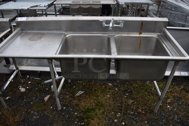 Stainless Steel Commercial 2 Bay Sink w/ Handles and Left Side Drainboard. 72x27x40. Bays 20x20x12. Drainboard 22x23x2