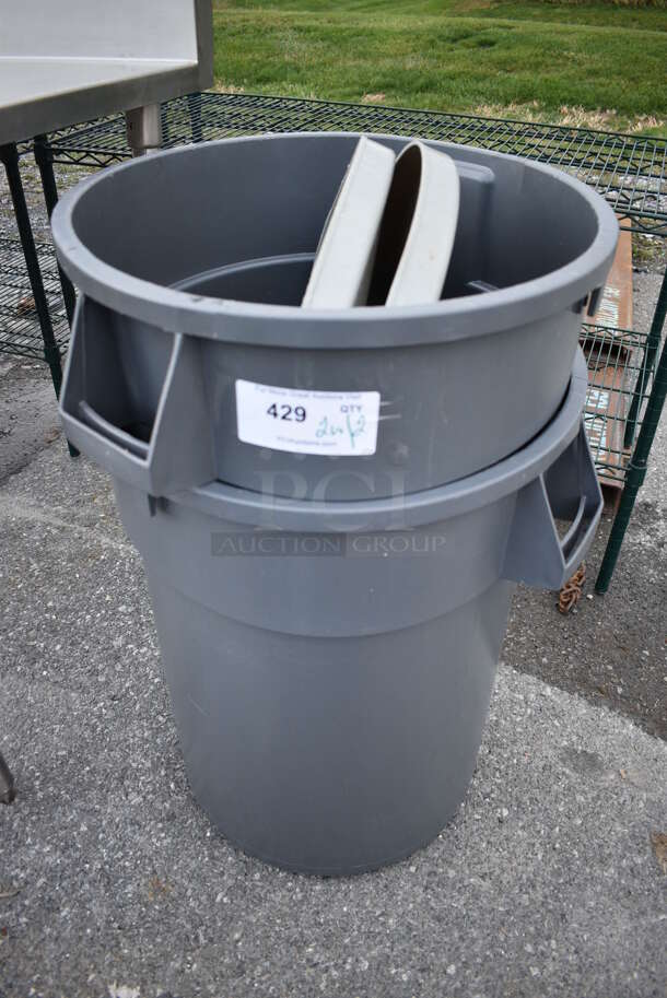 2 Gray Poly Trash Cans w/ 2 Light Gray Lids. 23x25x28. 2 Times Your Bid!