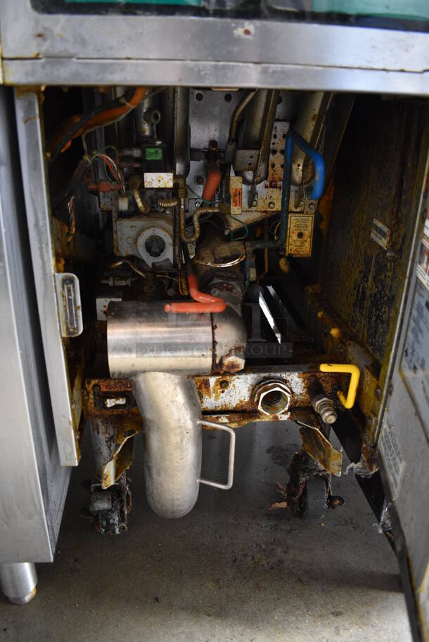 WWO! 2010 Pitco Frialator Model SFSG14 Stainless Steel Commercial Natural Gas Powered Deep Fat Fryer on Commercial Casters. 100,000 BTU. 16x34x48  - Image 6 of 7