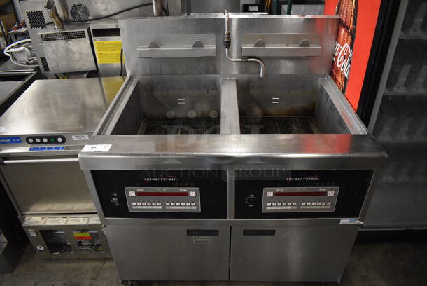 BEAUTIFUL! 2015 Henny Penny Model OFG-342 Stainless Steel Commercial Floor Style Natural Gas Powered 2 Bay Deep Fat Fryer on Commercial Casters. 240,000 BTU. 44x37x47 - Image 2 of 7