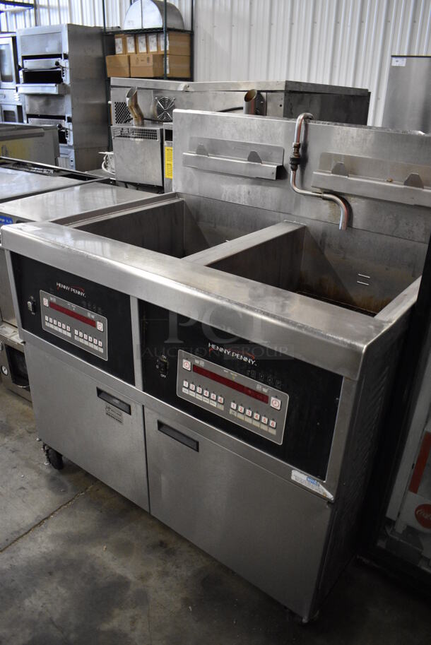 BEAUTIFUL! 2015 Henny Penny Model OFG-342 Stainless Steel Commercial Floor Style Natural Gas Powered 2 Bay Deep Fat Fryer on Commercial Casters. 240,000 BTU. 44x37x47 - Image 3 of 7