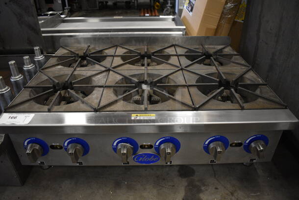 BRAND NEW! GREAT! Globe Stainless Steel Commercial Countertop Gas Powered 6 Burner Range. 36x26.5x15