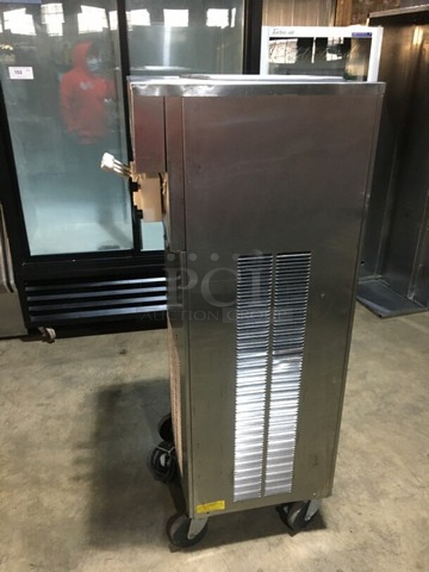 Wow! Saniserve 3 Handle Soft Serve Ice Cream Machine! Model A5271P Serial K131810! 208/230V 1 Phase! On Commercial Casters!  - Image 3 of 11