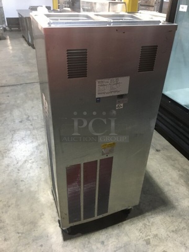 Wow! Saniserve 3 Handle Soft Serve Ice Cream Machine! Model A5271P Serial K131810! 208/230V 1 Phase! On Commercial Casters!  - Image 4 of 11