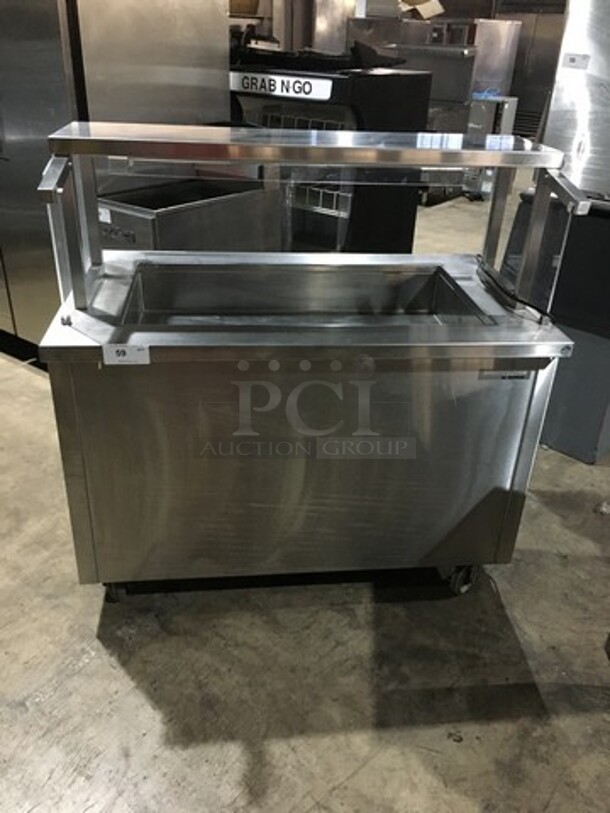 Delfield Refrigerated All Stainless Steel Refrigerated Cold Pan Salad Bar Island Merchandiser! With Sneeze Guard! Model KCSC50NU Serial 59213213M! 115V 1 Phase! On Commercial Casters! 