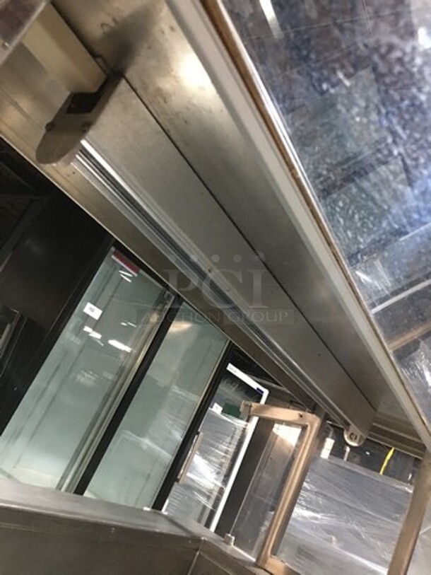 Delfield Refrigerated All Stainless Steel Refrigerated Cold Pan Salad Bar Island Merchandiser! With Sneeze Guard! Model KCSC50NU Serial 59213213M! 115V 1 Phase! On Commercial Casters!  - Image 6 of 12