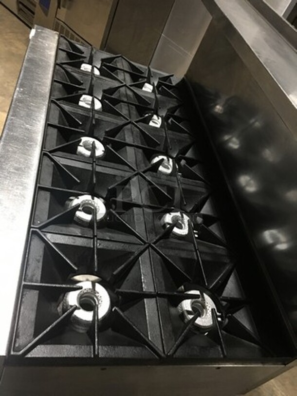 WOW! Vulcan Heavy Duty Commercial 10 Burner Range! With 2 Full Size Ovens Underneath! With All Stainless Steel Raised Backsplash & Salamander Shelf! With Metal Cooking Racks! On Commercial Casters!  - Image 5 of 11