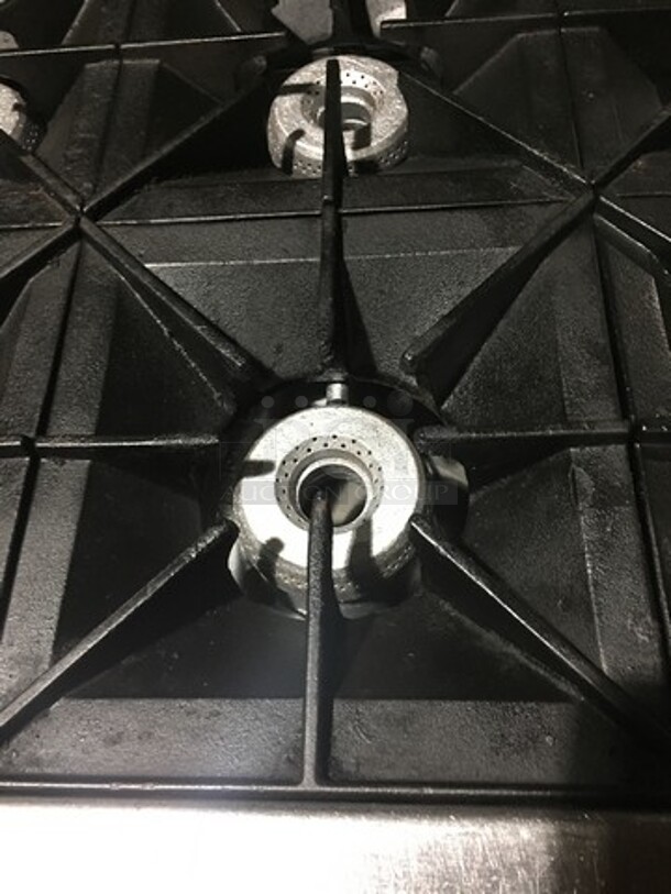 WOW! Vulcan Heavy Duty Commercial 10 Burner Range! With 2 Full Size Ovens Underneath! With All Stainless Steel Raised Backsplash & Salamander Shelf! With Metal Cooking Racks! On Commercial Casters!  - Image 6 of 11