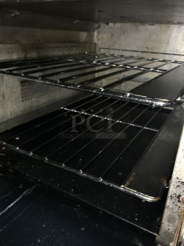 WOW! Vulcan Heavy Duty Commercial 10 Burner Range! With 2 Full Size Ovens Underneath! With All Stainless Steel Raised Backsplash & Salamander Shelf! With Metal Cooking Racks! On Commercial Casters!  - Image 9 of 11