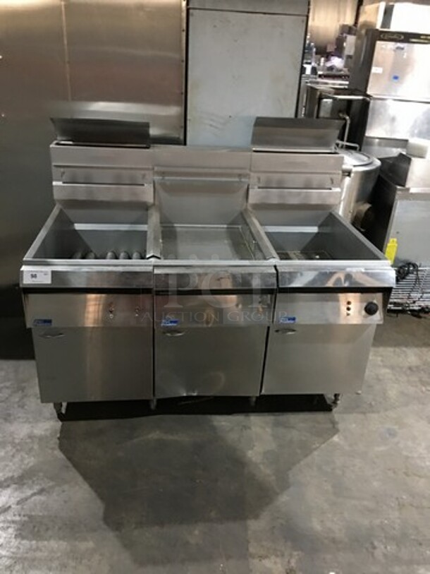 Nice! Pitco Dual 75LBS Natural Gas Powered 2 Bay Deep Fat Fryer! With Dump Station! Each Bay Is 5 Burners! With Oil Filter! Model F183S Serial 10-86AX20277SNPS! On Legs!  - Image 1 of 12