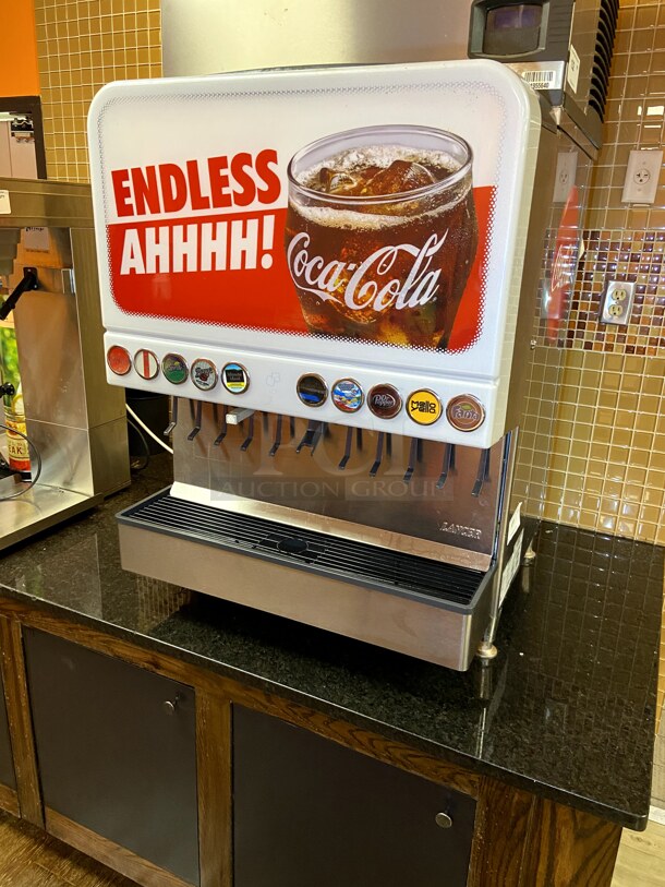 Lancer Soda Fountain.  Newer model. Very good condition. Unit has been disconnected by CocaCola company. (Dispenser only. NOT the ice maker.)