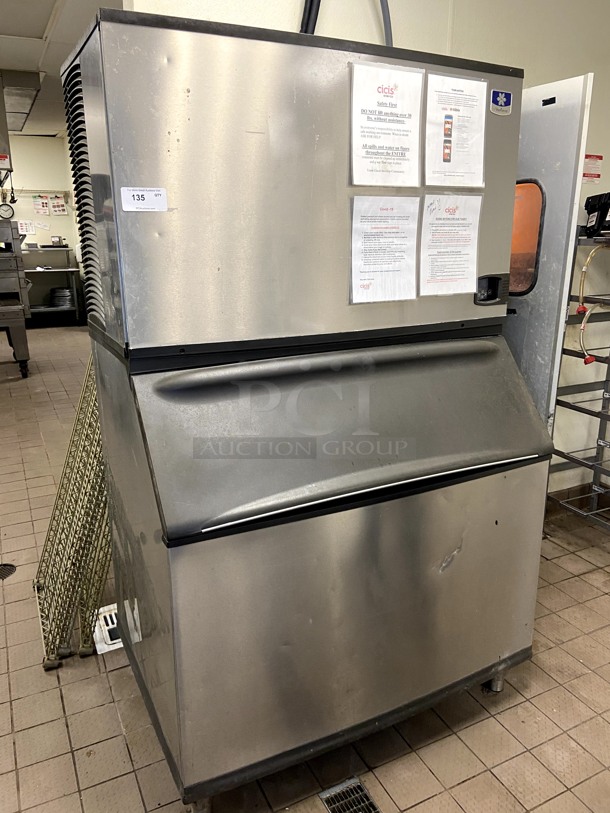 Manitowoc Ice maker w/ Bin.  1400 pounds per day, w/ 900 pound SS storage bin. Remote unit with condenser on the roof.  Working when store closed. ** PROFESSIONAL REMOVAL REQUIRED by EPA Certified technician. ***