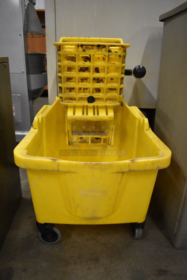 Yellow Poly Mop Bucket w/ Wringing Attachment on Casters. 16x22x25 - Image 1 of 4