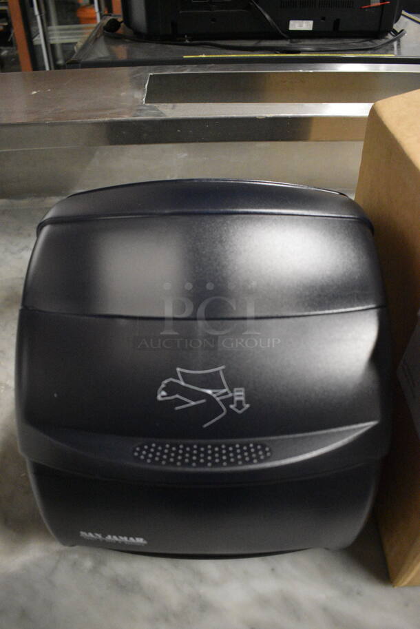 IN ORIGINAL BOX! San Jamar Black Poly Wall Mount Paper Towel Dispenser. 12x12x13 - Image 1 of 5