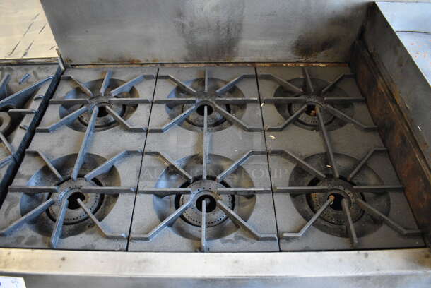 WOW! Vulcan Stainless Steel Commercial Gas Powered Floor Style 6 Burner w/ Right Side Flat Top Griddle, 2 Lower Ovens and Stainless Steel Overshelf on Commercial Casters. 60x32x60 - Image 3 of 7