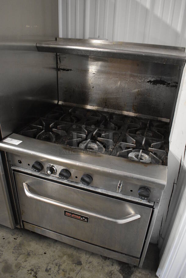 GREAT! Tri-Star Stainless Steel Commercial Gas Powered 6 Burner Range w/ Lower oven and Stainless Steel Overshelf on Commercial Casters. 36x32x56  - Image 2 of 6