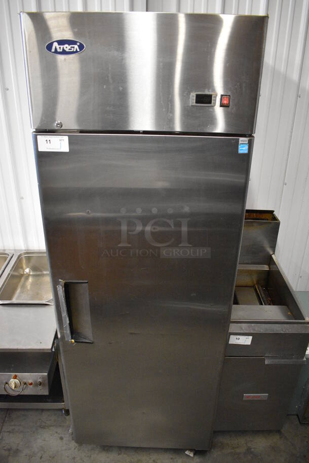 GREAT! 2015 Atosa Model MBF8004 ENERGY STAR Stainless Steel Commercial Single Door Reach In Cooler w/ Poly Coated Racks on Commercial Casters. 115 Volts, 1 Phase. 29x32x83. Tested and Working! - Image 1 of 6