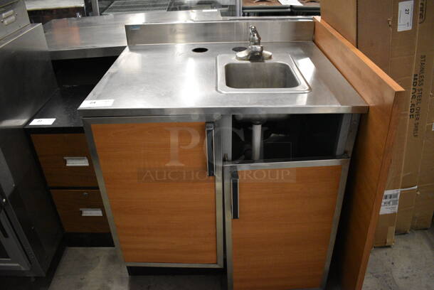 Duke Stainless Steel Commercial Counter w/ Sink Basin, Faucet, Handle and 2 Wood Pattern Doors. Door Needs To Be Reattached. 36x30x41