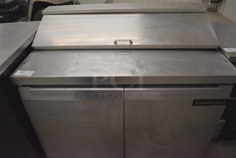 NICE! Continental Model SW48-12 Stainless Steel Commercial Sandwich Salad Prep Table Bain Marie Mega Top on Commercial Casters. 115 Volts, 1 Phase. 48x31x43. Tested and Powers On But Temps at 46 Degrees