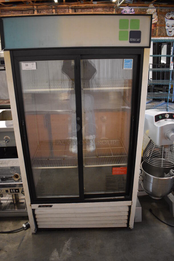WOW! Turbo Air Model TGM-35R ENERGY STAR Metal Commercial 2 Door Reach In Cooler Merchandiser w/ Poly Coated Racks. 115 Volts, 1 Phase. 42x30x79. Tested and Powers On But Does Not Get Cold - Image 1 of 7