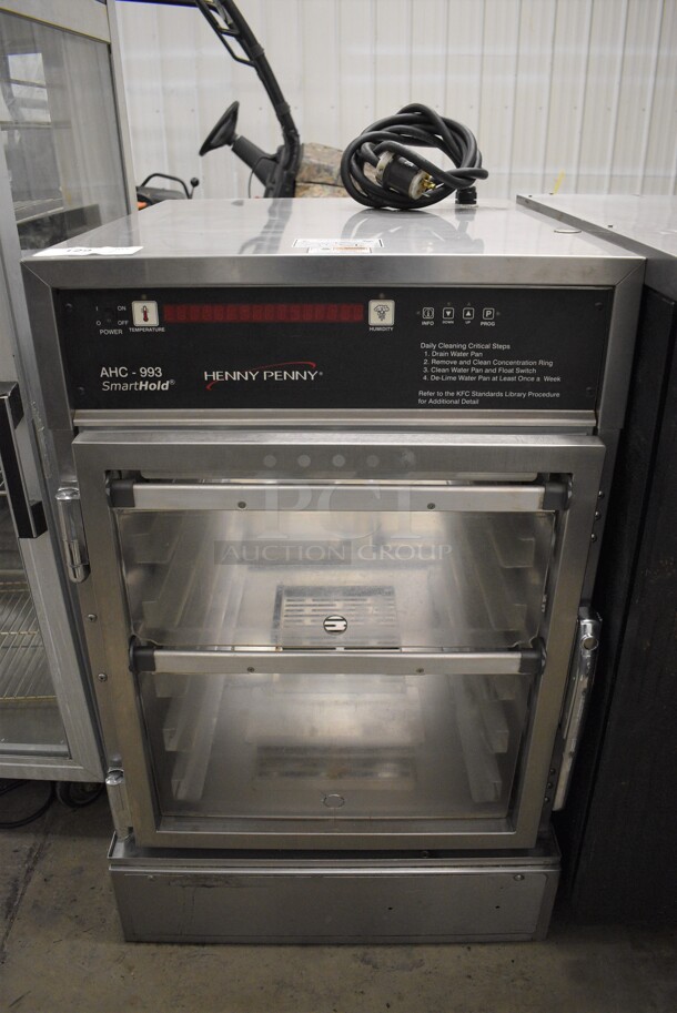 GREAT! Henny Penny Model AHC-993 Stainless Steel Commercial Electric Powered Pass Through Warming Holding Cabinet Merchandiser. 120 Volts, 1 Phase. 24x30x38. Cannot Test Due To Plug Style - Image 1 of 7