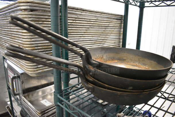 4 Cast Iron Skillets. 20x11x2.5. 4 Times Your Bid!