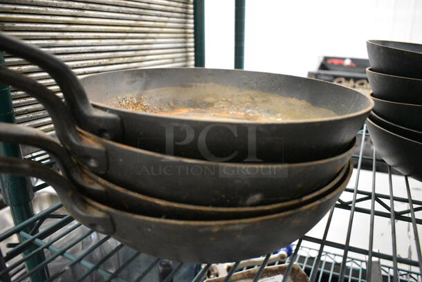 4 Cast Iron Skillets. 20x11x2.5. 4 Times Your Bid! - Image 2 of 3