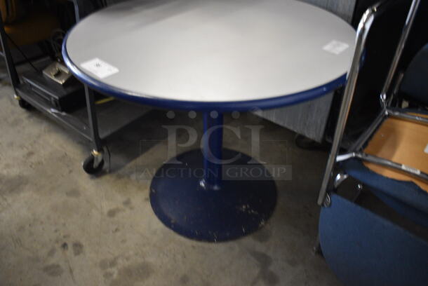 Gray Round Table w/ Blue Rim on Blue Metal Table Base. 36x36x29 - Image 2 of 4