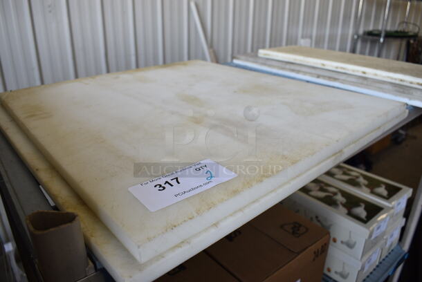 2 Various White Cutting Boards. 22x1x24, 24x1x24. 2 Times Your Bid!