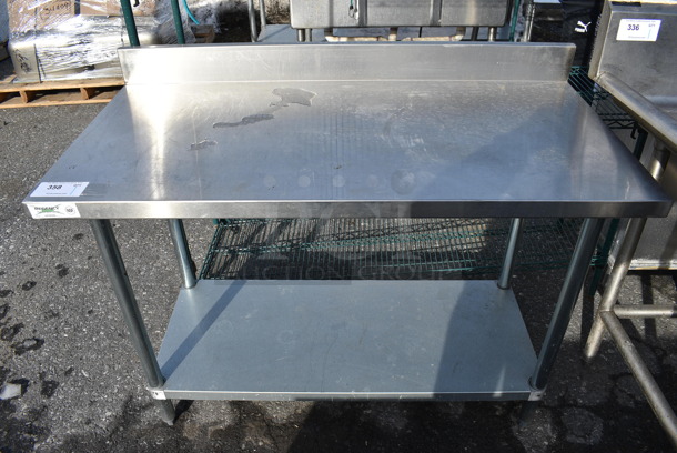 Stainless Steel Commercial Table w/ Metal Undershelf and Backsplash. 48x24x38