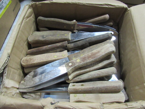 One Mega Lot Of NEW Steak Knives.